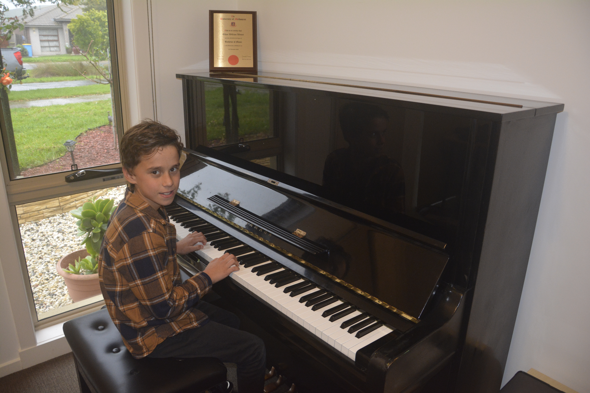 Vincent during a kids piano lesson